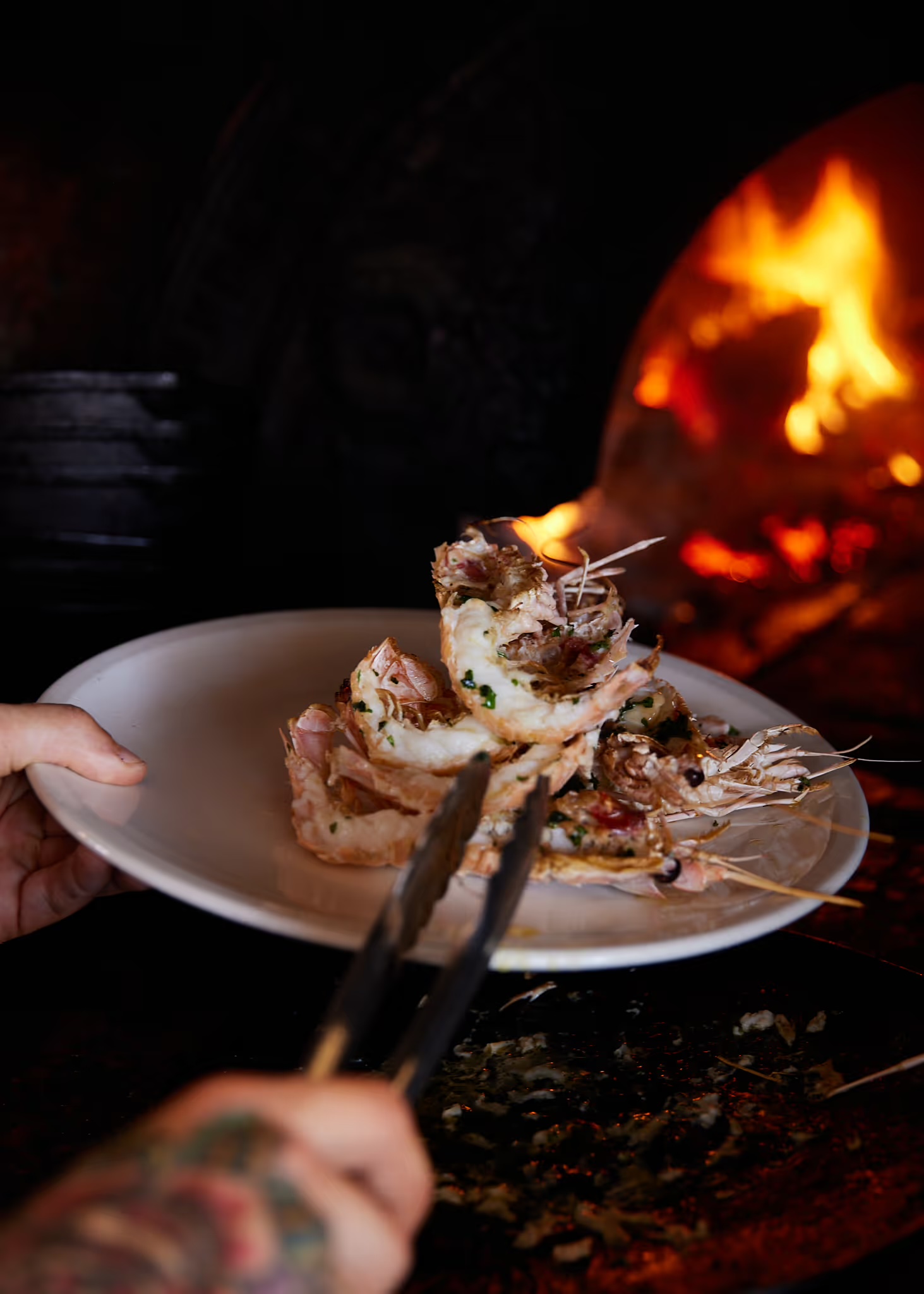 Seafood cooked over fire at Grappa The Rocks